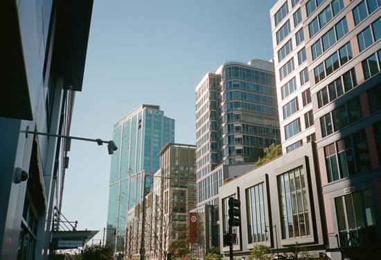 Modern Calgary business district with downtown skyline and a business team in discussion