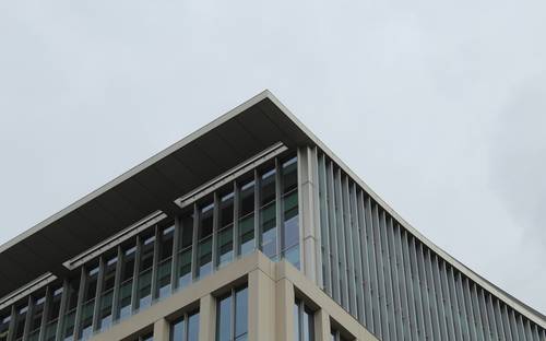 Modern Charlottetown business district with office buildings and a PEI business team collaborating