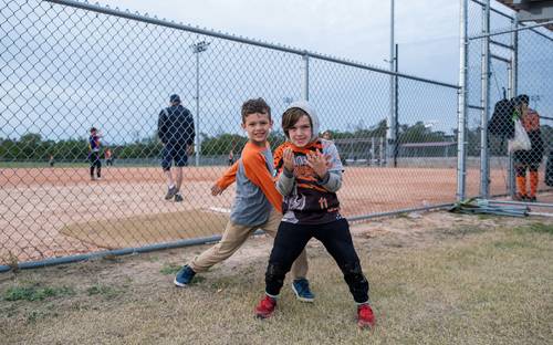 Saskatchewan family enjoying sports event, representing family tax credits and benefits