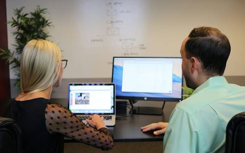 Team of professionals working in a Saskatchewan office environment