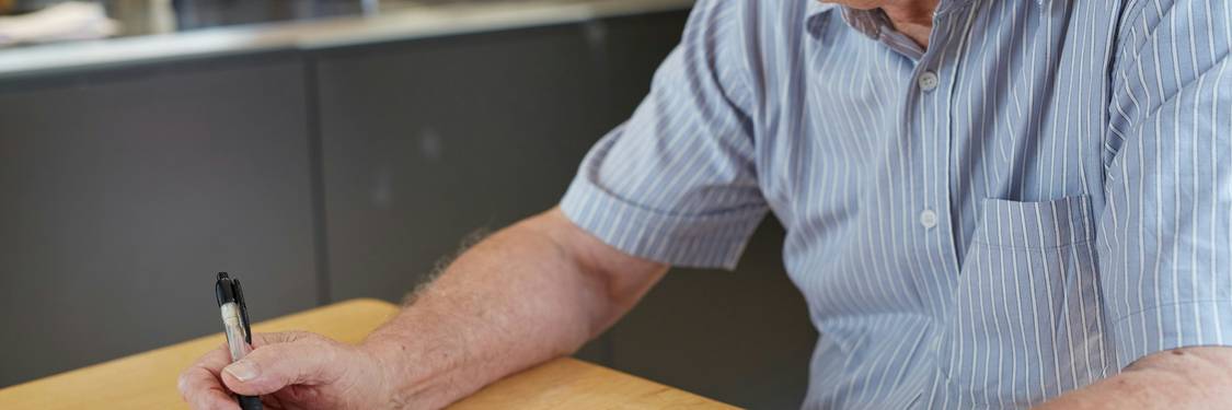 Yukon seniors reviewing paperwork for tax credits